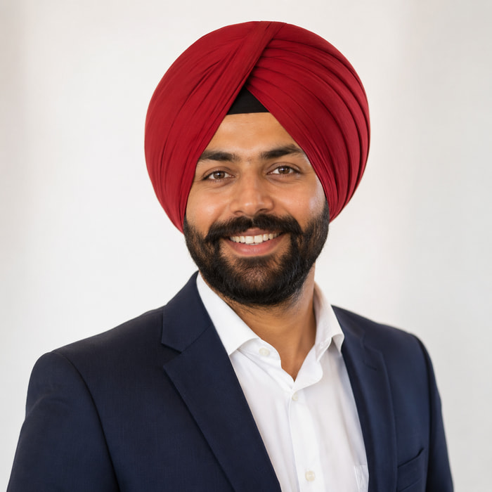 An experienced immigration consultant at MD Consulting Group advising a Punjabi family on their visitor visa application
